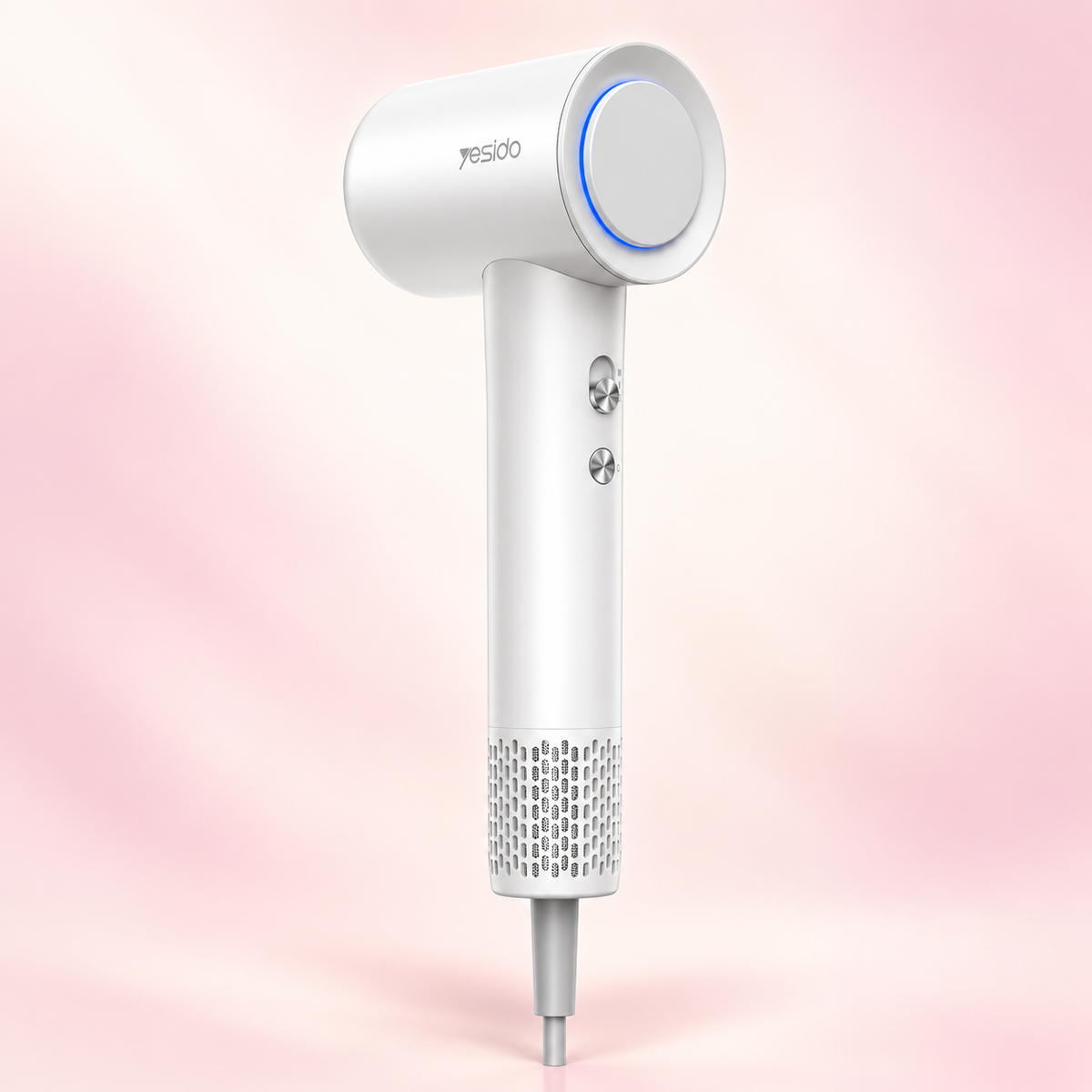 Sèche-cheveux ionique blanc vu de profil sur fond rose